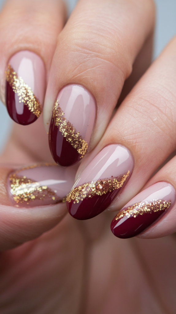 Split-color nails with half-black, half-white design, featuring silver glitter along the divide.
