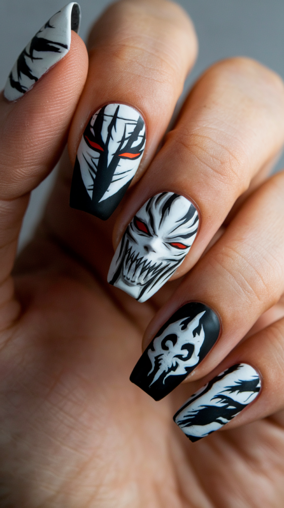 Black and white nails with Ichigo’s Hollow mask and the Soul Society insignia, featuring sharp contrasts