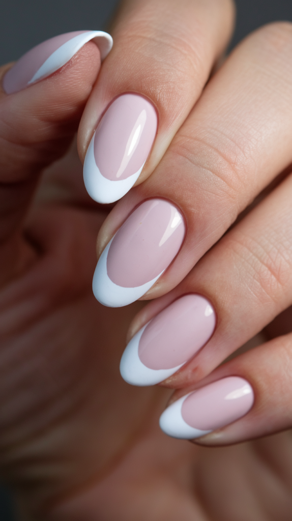 Nails with a matte pink base paired with glossy pink tips, creating a modern contrast in textures