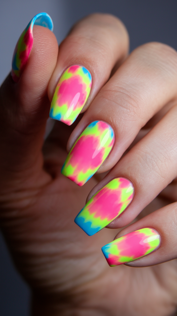 Neon glitter fade nail art with yellow to orange ombre and sparkling glitter tips.