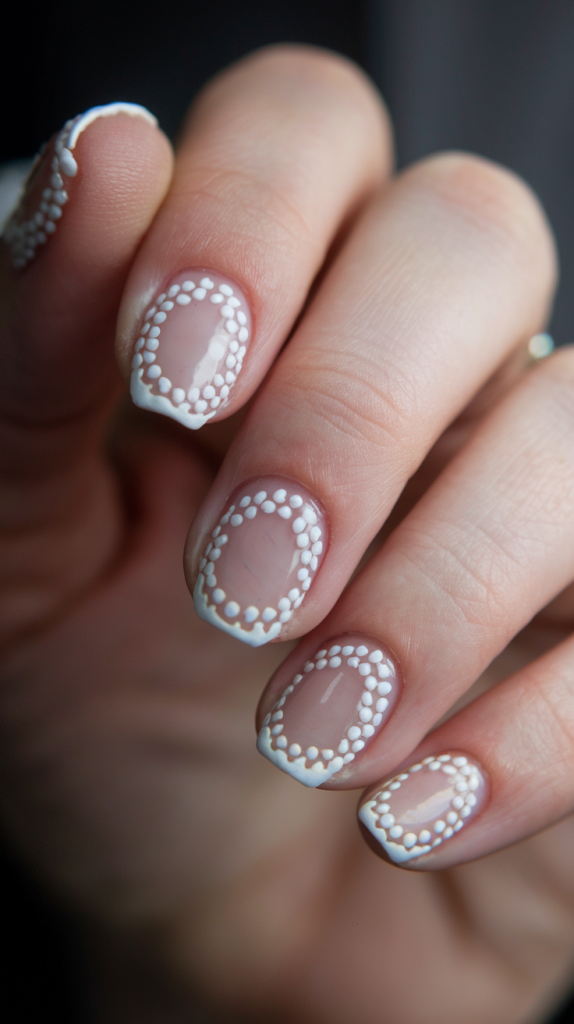 Monochrome Dotted French Tips: Black tips with white dots, or white tips with black dots.
