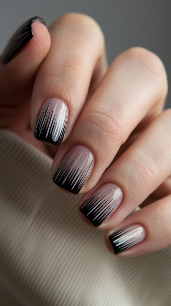 Navy blue nails with thin white pinstripes, mimicking a tailored suit.

