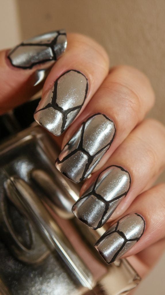 Robotic Fingers – Silver metallic nails segmented by thin black lines, mimicking robotic joints.
