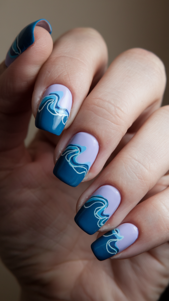 Flowing gradient waves transitioning from deep blue to lavender, with smooth, organic wave patterns