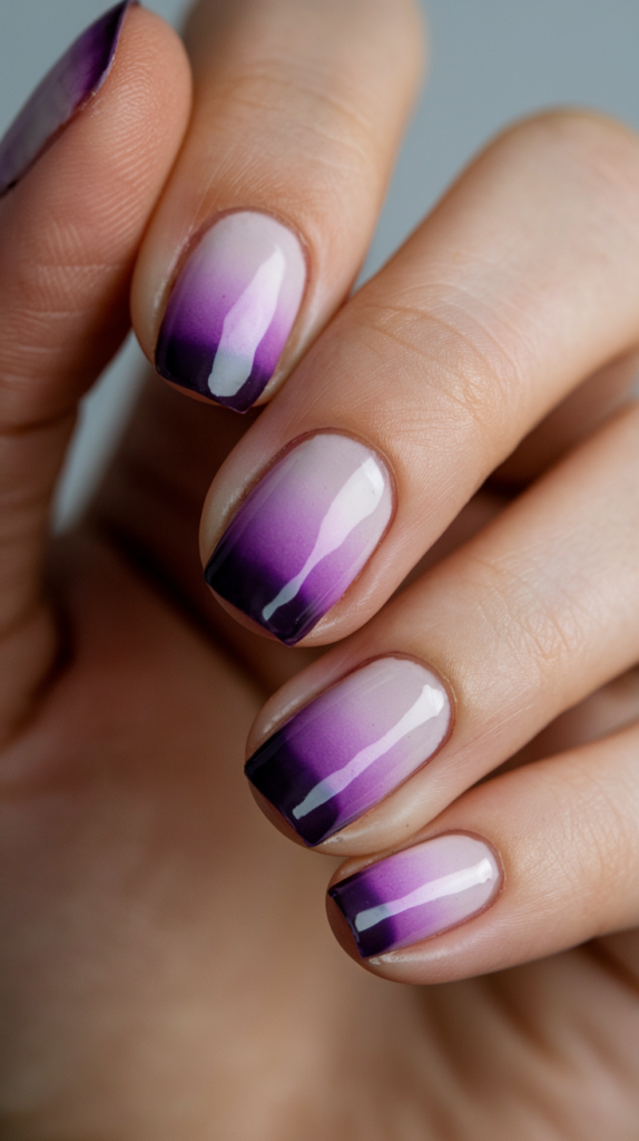 A smooth gradient from a soft lilac color at the cuticle to deep violet at the tips, providing a refined, sophisticated look.