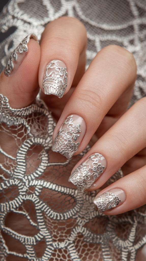 Elegant silver lace designs painted on a pastel background for a feminine and intricate look.
