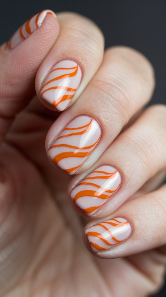 Sharp black and white geometric patterns over a bright orange base for a bold look.
